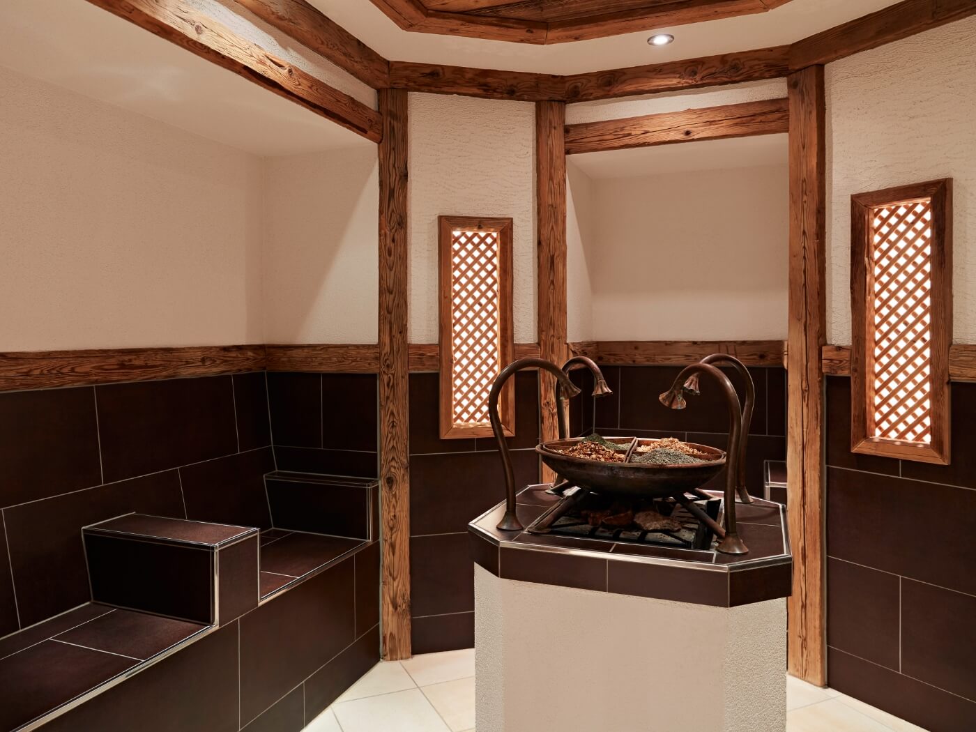 A steam sauna in earth tones for a wellness weekend in Kitzbühel
